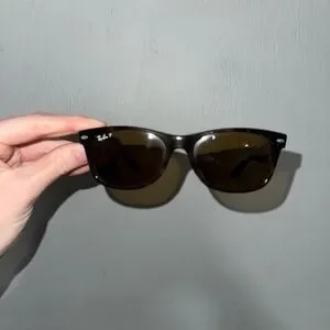 Ray-Ban Black Wayfarer Sunglasses Timeless Design. Only worn a handful of times. The Enduring Appeal of the Classic Wayfarer - InsideHook main image 4